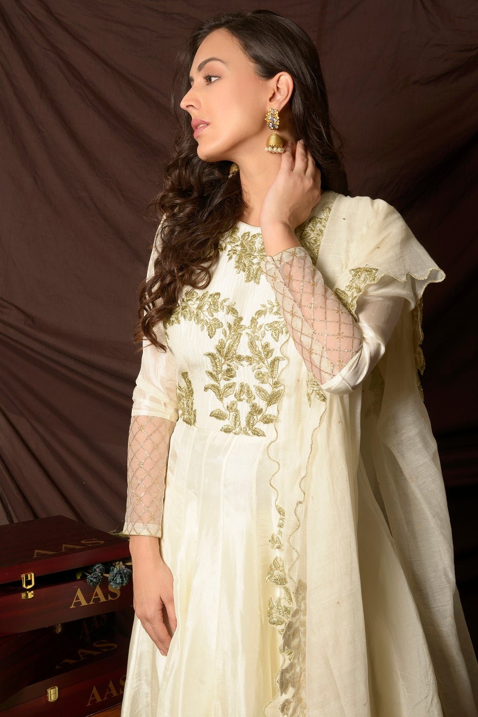 Buy gorgeous off-white embroidered Uppada silk suit online in USA with matching dupatta. Shine at weddings and special occasions with beautiful Indian designer suits, gowns, lehengas from Pure Elegance Indian clothing store in USA.-closeup