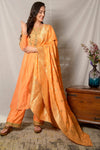Buy stunning orange color embroidered chanderi palazzo suit online in USA with matching dupatta. Shine at weddings and special occasions with beautiful Indian designer suits, gowns, lehengas from Pure Elegance Indian clothing store in USA.-full view