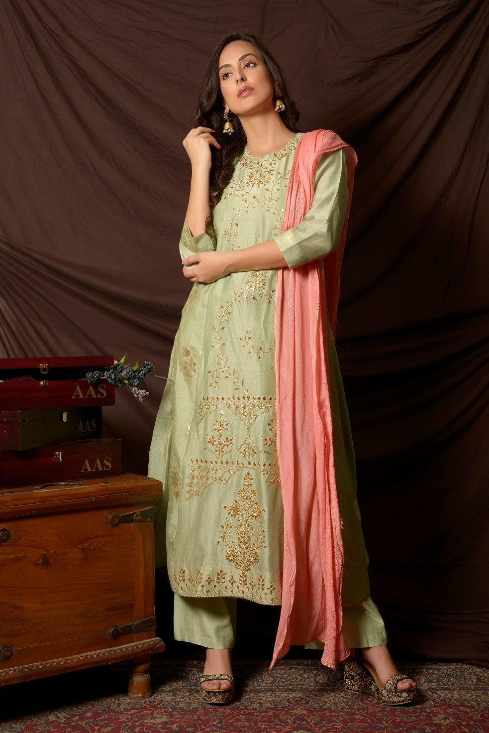 Buy gorgeous dusty green embroidered chanderi suit online in USA with pink dupatta. Shine at weddings and special occasions with beautiful Indian designer suits, gowns, lehengas from Pure Elegance Indian clothing store in USA.-full view