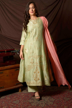 Buy gorgeous dusty green embroidered chanderi suit online in USA with pink dupatta. Shine at weddings and special occasions with beautiful Indian designer suits, gowns, lehengas from Pure Elegance Indian clothing store in USA.-suit