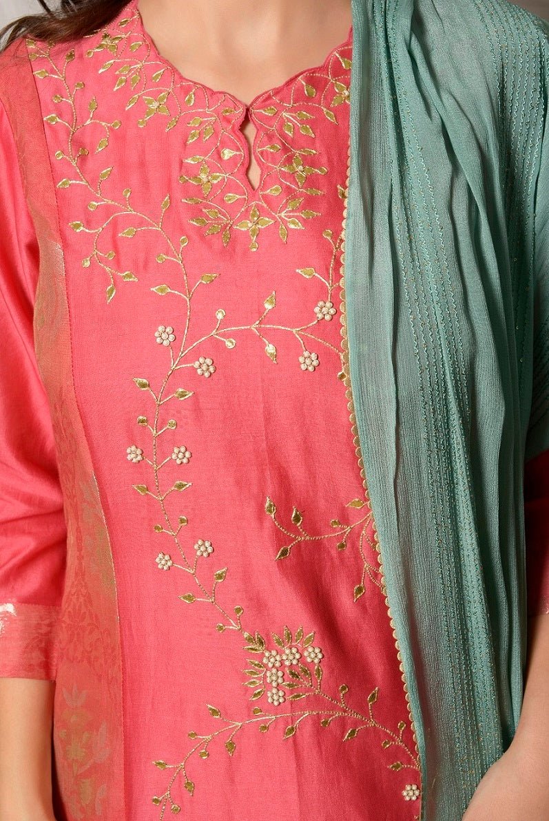 Buy stunning tomato red embroidered chanderi suit online in USA with aqua dupatta. Shine at weddings and special occasions with beautiful Indian designer suits, gowns, lehengas from Pure Elegance Indian clothing store in USA.-closeup