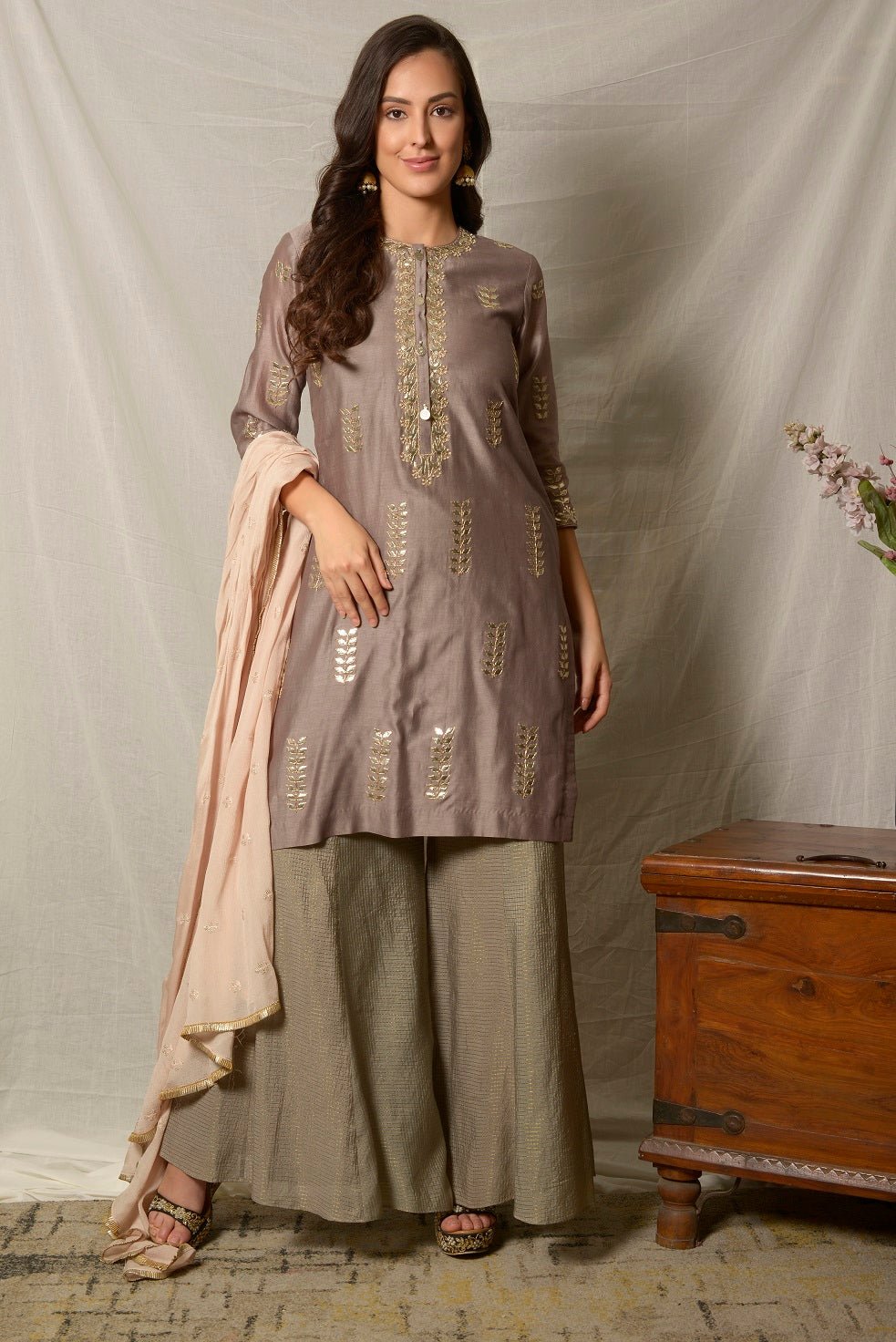Shop elegant grey embroidered chanderi suit online in USA with dupatta and palazzo. Shine at weddings and special occasions with beautiful Indian designer suits, gowns, lehengas from Pure Elegance Indian clothing store in USA.-full view