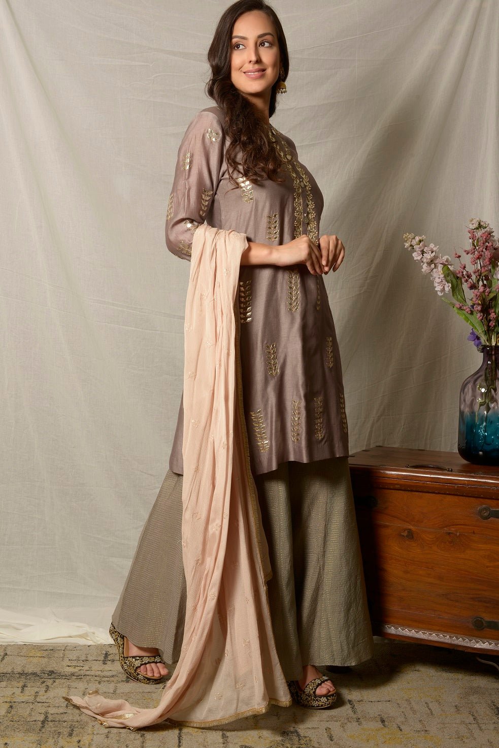 Shop elegant grey embroidered chanderi suit online in USA with dupatta and palazzo. Shine at weddings and special occasions with beautiful Indian designer suits, gowns, lehengas from Pure Elegance Indian clothing store in USA.-right