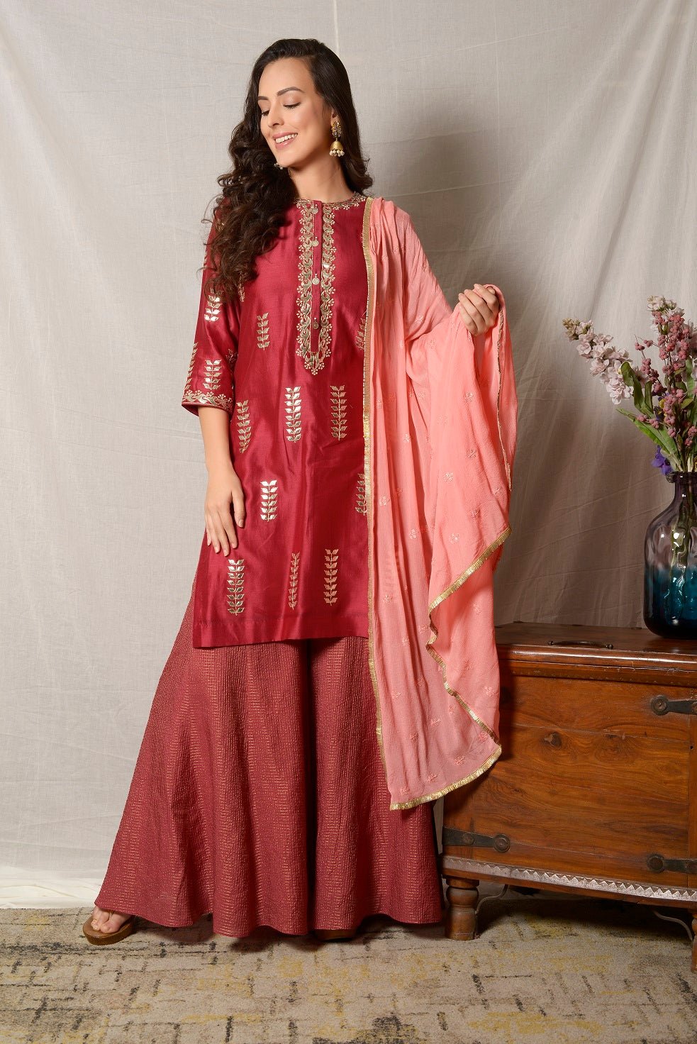 Buy gorgeous rose red gota embroidery chanderi suit online in USA with dupatta and palazzo. Shine at weddings and special occasions with beautiful Indian designer suits, gowns, lehengas from Pure Elegance Indian clothing store in USA.-full view