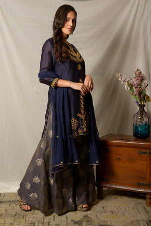 Shop gorgeous cobalt blue and grey embroidered chanderi suit online in USA with dupatta and grey palazzo. Shine at weddings and special occasions with beautiful Indian designer suits, gowns, lehengas from Pure Elegance Indian clothing store in USA.-side