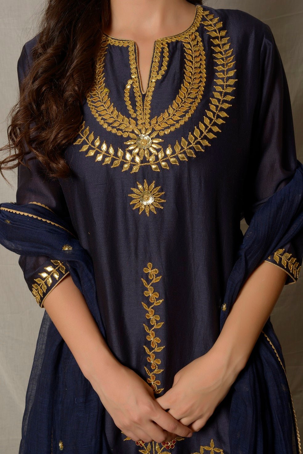Shop gorgeous cobalt blue and grey embroidered chanderi suit online in USA with dupatta and grey palazzo. Shine at weddings and special occasions with beautiful Indian designer suits, gowns, lehengas from Pure Elegance Indian clothing store in USA.-closeup