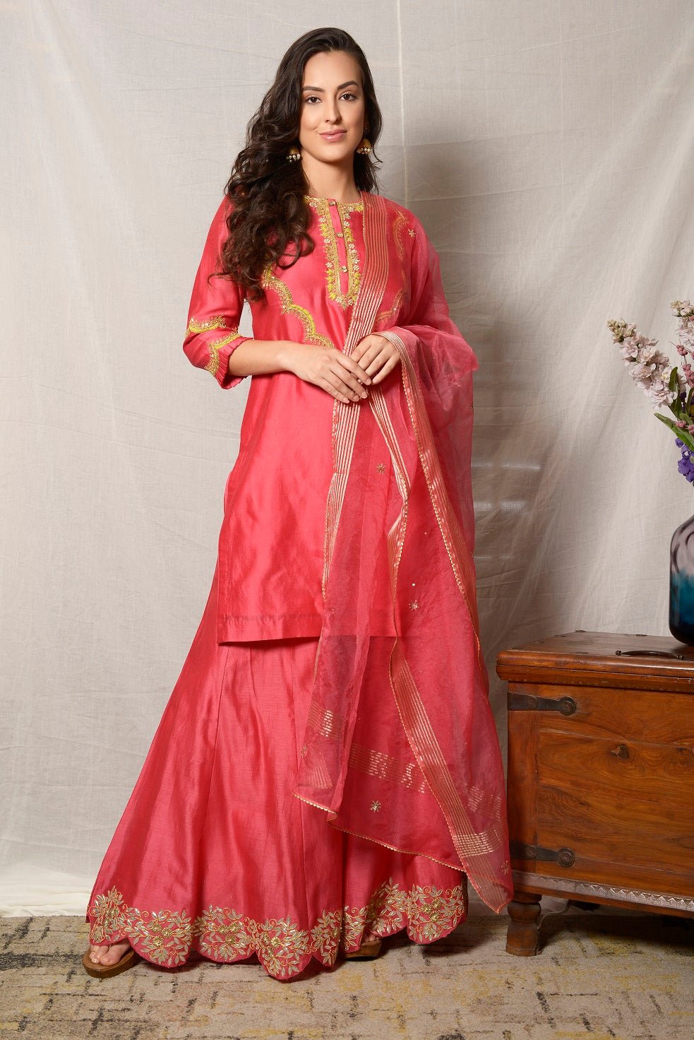 Buy stunning tomato red embroidered chanderi sharara suit online in USA with dupatta. Shine at weddings and special occasions with beautiful Indian designer suits, gowns, lehengas from Pure Elegance Indian clothing store in USA.-full view