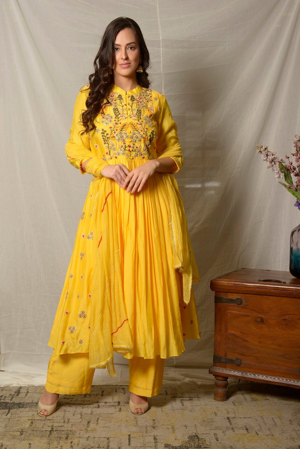 Shop bright yellow embroidered cotton silk suit online in USA with dupatta. Shine at weddings and special occasions with beautiful Indian designer suits, gowns, lehengas from Pure Elegance Indian clothing store in USA.-front
