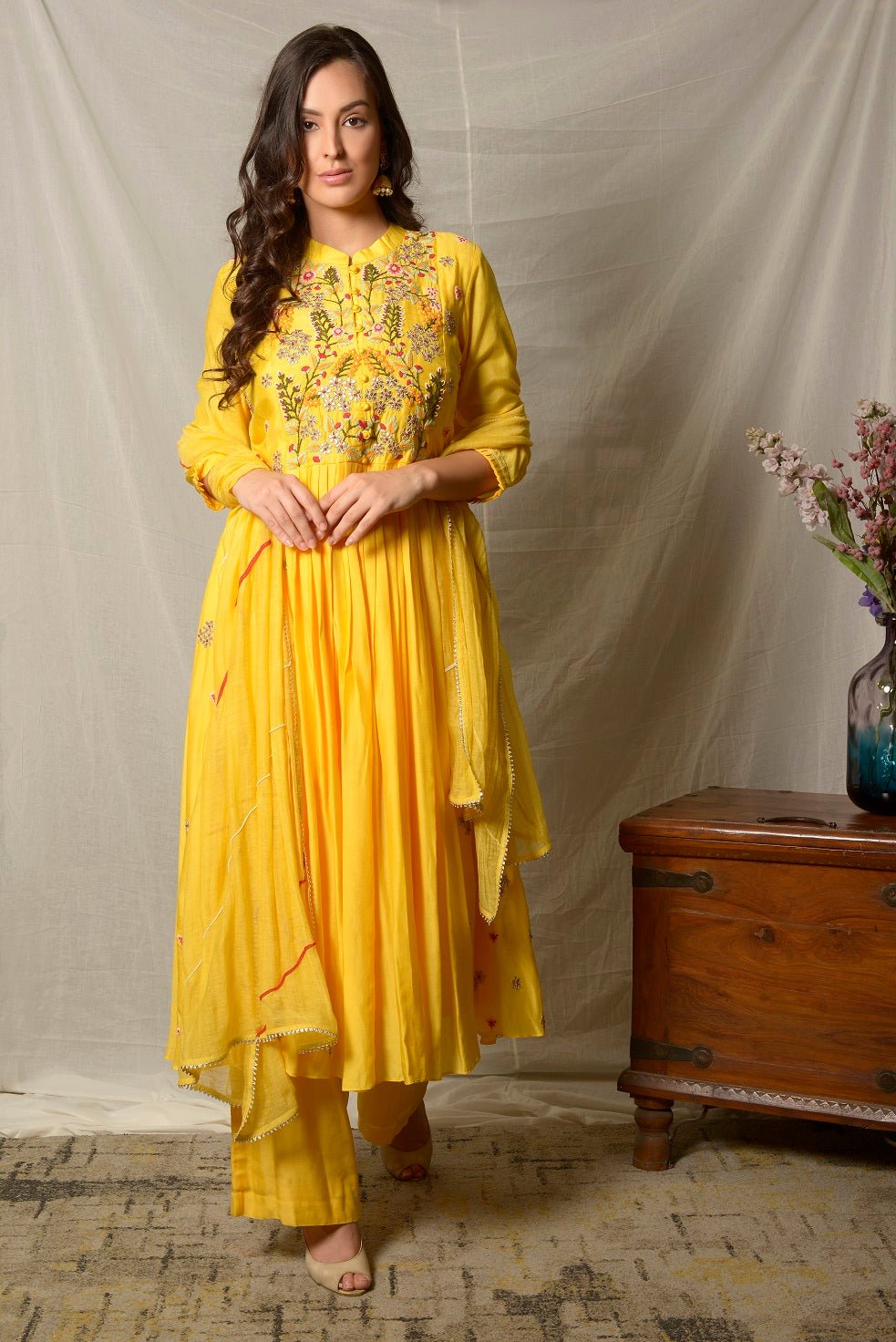 Shop bright yellow embroidered cotton silk suit online in USA with dupatta. Shine at weddings and special occasions with beautiful Indian designer suits, gowns, lehengas from Pure Elegance Indian clothing store in USA.-suit