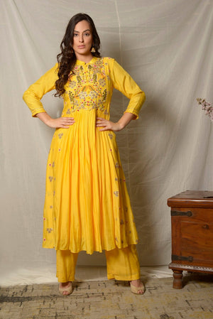 Shop bright yellow embroidered cotton silk suit online in USA with dupatta. Shine at weddings and special occasions with beautiful Indian designer suits, gowns, lehengas from Pure Elegance Indian clothing store in USA.-without dupatta