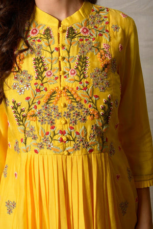 Shop bright yellow embroidered cotton silk suit online in USA with dupatta. Shine at weddings and special occasions with beautiful Indian designer suits, gowns, lehengas from Pure Elegance Indian clothing store in USA.-closeup