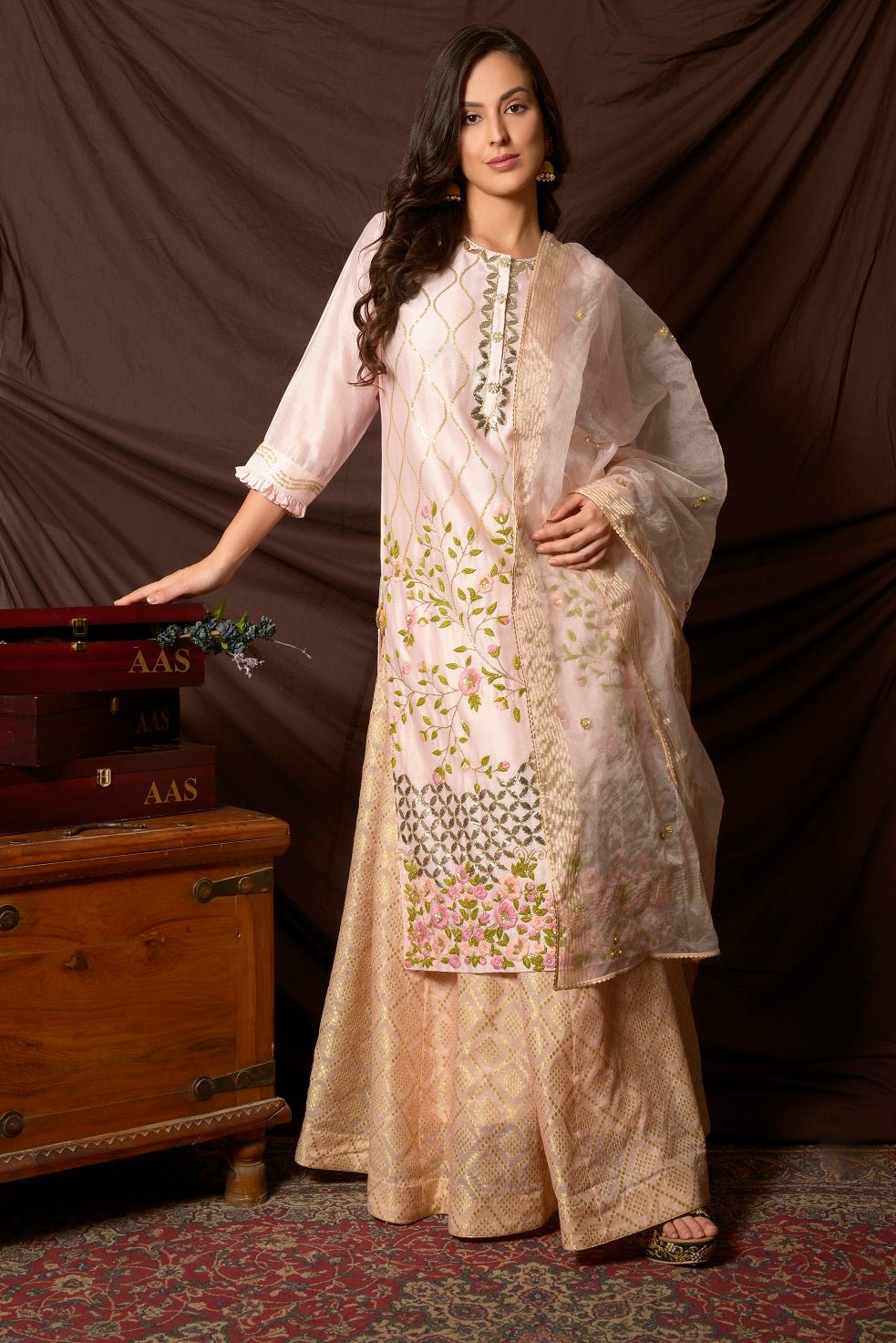 Shop stunning baby pink embroidered chanderi suit online in USA with palazzo and dupatta. Shine at weddings and special occasions with beautiful Indian designer suits, gowns, lehengas from Pure Elegance Indian clothing store in USA.-front