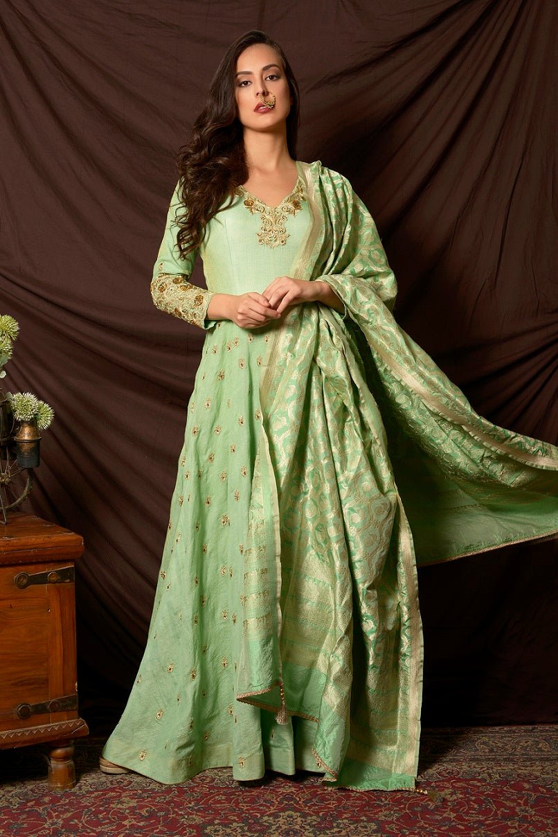 Buy gorgeous sea green embroidered tissue chanderi Anarkali suit online in USA with Banarasi dupatta. Shine at weddings and special occasions with beautiful Indian Anarkali suits, gowns, lehengas from Pure Elegance Indian clothing store in USA.-full view