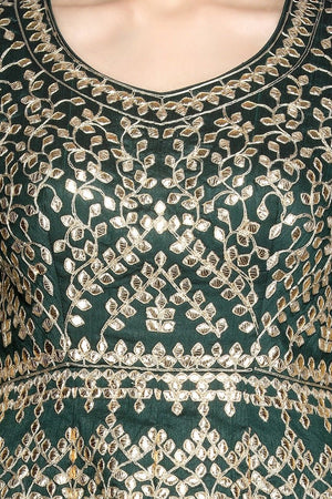 Shop beautiful dark green gota work Anarkali online in USA with net dupatta. Dazzle on weddings and special occasions with exquisite Indian designer dresses, sharara suits, Anarkali suits, bridal lehegas from Pure Elegance Indian fashion store in USA.-closeup