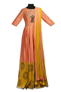 Shop stunning peach and yellow embroidered chanderi Anarkali online in USA with dupatta. Shine at weddings and special occasions with beautiful Indian designer Anarkali suits, traditional salwar suits, sharara suits, designer lehengas from Pure Elegance Indian clothing store in USA.-full view