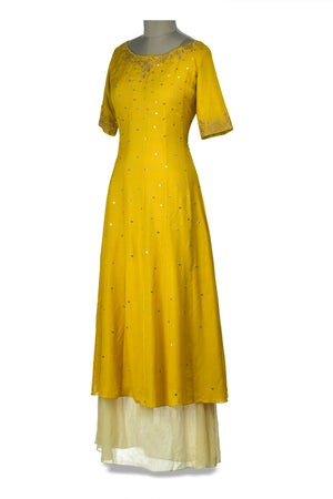 Buy beautiful yellow and cream embroidered layered maxi dress online in USA. Shine at weddings and special occasions with beautiful Indian designer Anarkali suits, traditional salwar suits, sharara suits, designer lehengas from Pure Elegance Indian clothing store in USA.-side