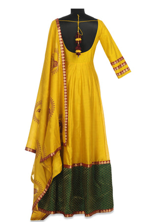 Buy stunning yellow embroidered chanderi Anarkali online in USA with green border and matching dupatta. Shine at weddings and special occasions with beautiful Indian designer Anarkali suits, traditional salwar suits, sharara suits, designer lehengas from Pure Elegance Indian clothing store in USA.-back
