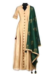 Shop elegant beige embroidered chanderi Anarkali online in USA with green block print dupatta. Shine at weddings and special occasions with beautiful Indian designer Anarkali suits, salwar suits, sharara suits, designer lehengas from Pure Elegance Indian clothing store in USA.-full view