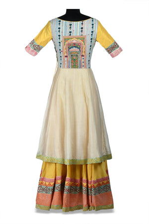 Buy gorgeous ivory and multi printed double layered Anarkali online in USA. Shine at weddings and special occasions with beautiful Indian designer Anarkali suits, salwar suits, sharara suits, designer lehengas from Pure Elegance Indian clothing store in USA.-back