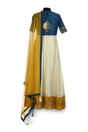 Buy beautiful ivory and blue color embroidered chanderi Anarkali online in USA with yellow dupatta. Shine at weddings and special occasions with beautiful Indian designer Anarkali suits, salwar suits, sharara suits, designer lehengas from Pure Elegance Indian clothing store in USA.-back