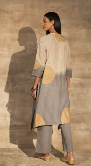 Buy stunning cream and grey linen pant suit online in USA with golden polka print. Make a fashion statement on festive occasions with designer suits, sharara suits, partywear dresses, salwar suits from Pure Elegance Indian fashion store in USA.-back
