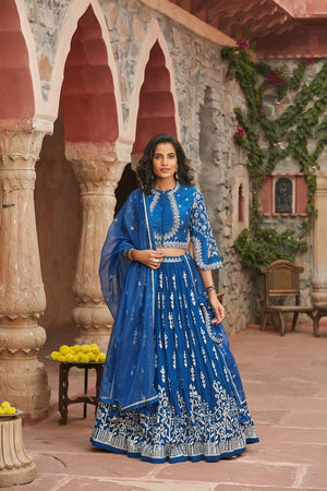 Shop stunning blue embroidered choli cut lehenga online in USA with dupatta. Elevate your ethnic style with a tasteful collection of designer Anarkali, designer salwar suits, designer lehengas, sharara suits from Pure Elegance Indian clothing store in USA.-front