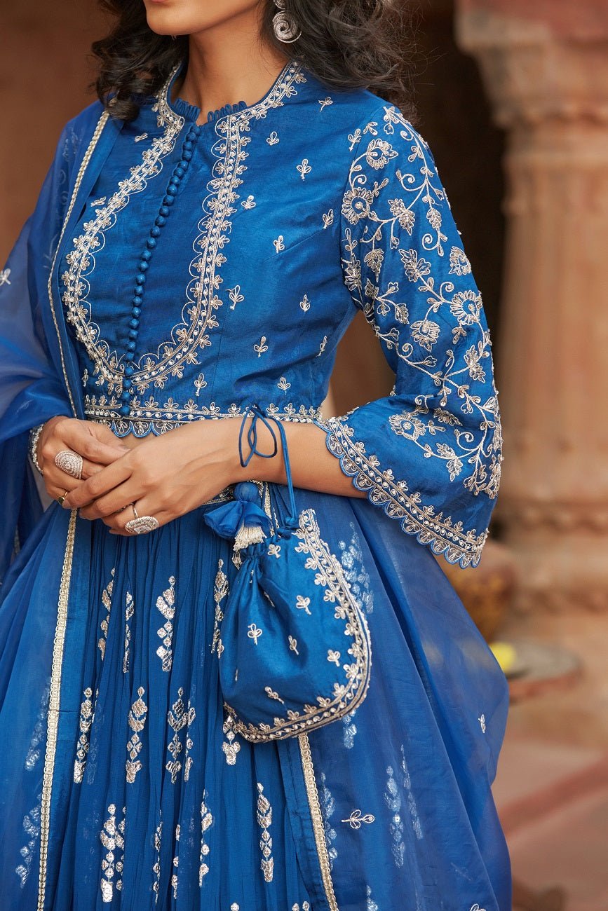 Shop stunning blue embroidered choli cut lehenga online in USA with dupatta. Elevate your ethnic style with a tasteful collection of designer Anarkali, designer salwar suits, designer lehengas, sharara suits from Pure Elegance Indian clothing store in USA.-closeup