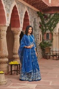 Shop stunning blue embroidered choli cut lehenga online in USA with dupatta. Elevate your ethnic style with a tasteful collection of designer Anarkali, designer salwar suits, designer lehengas, sharara suits from Pure Elegance Indian clothing store in USA.-full view