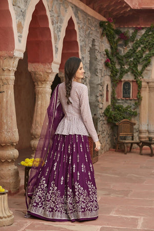 Buy stunning wine color embroidered lehenga online in USA with peplum jacket and dupatta. Elevate your ethnic style with a tasteful collection of designer Anarkali, designer salwar suits, designer lehengas, sharara suits from Pure Elegance Indian clothing store in USA.-back