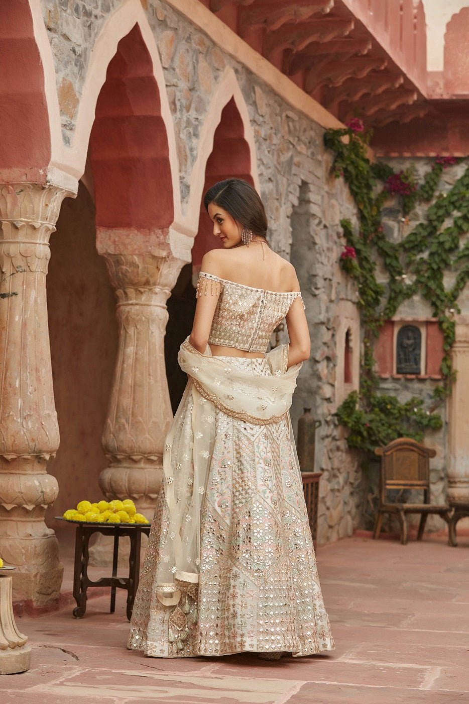 Buy beautiful ivory self embroidery chinon lehenga online in USA with dupatta. Elevate your ethnic style with a tasteful collection of designer Anarkali, designer salwar suits, designer lehengas, sharara suits from Pure Elegance Indian clothing store in USA.-back