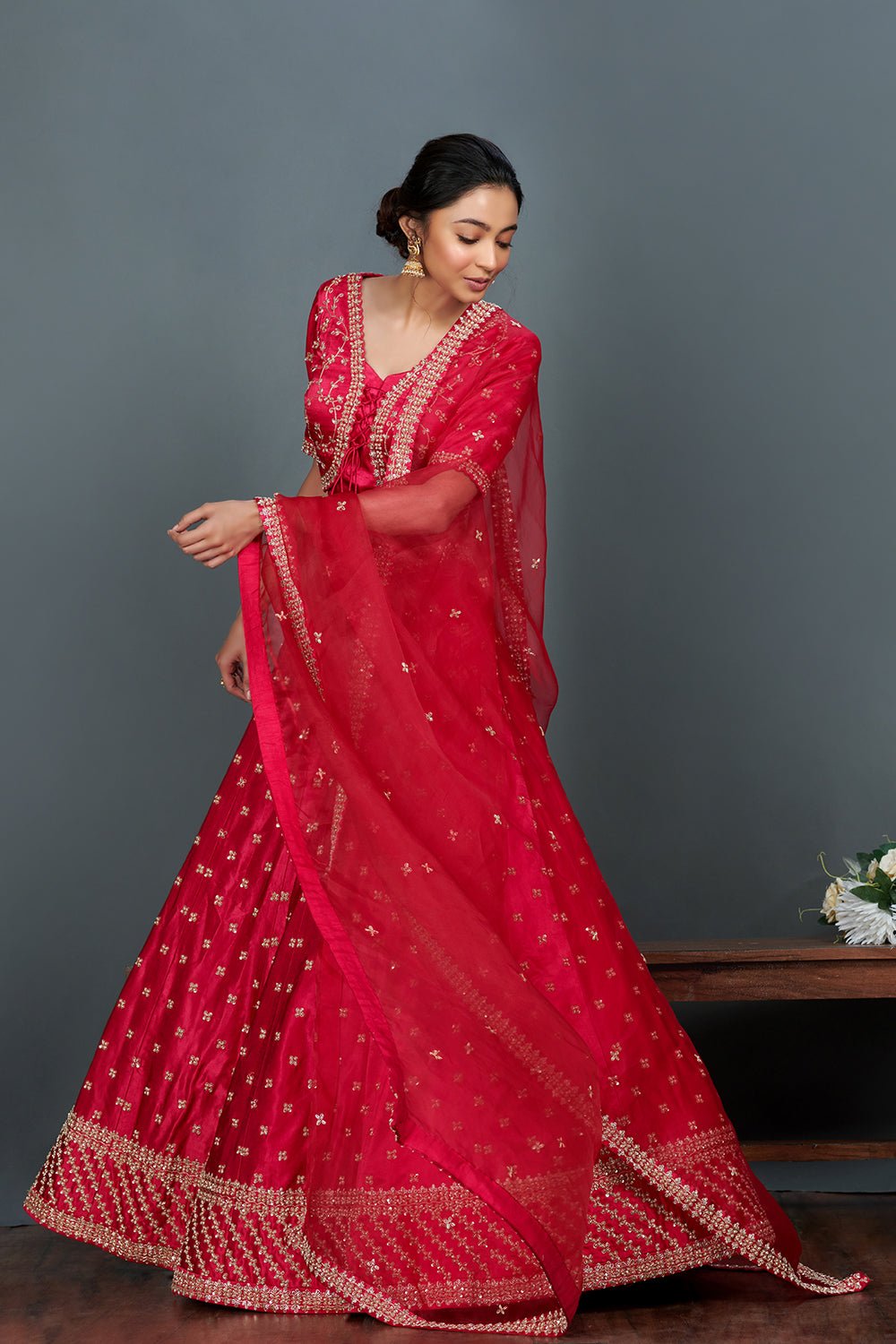 Shop stunning bright pink embroidered cotton lehenga set online in USA.  Make a fashion statement on festive occasions and weddings with designer suits, Indian dresses, Anarkali suits, palazzo suits, designer gowns, sharara suits from Pure Elegance Indian fashion store in USA.-left
