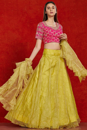 Buy beautiful pink and lime green organza lehenga set online in USA with ruffle dupatta.  Make a fashion statement on festive occasions and weddings with designer suits, Indian dresses, Anarkali suits, palazzo suits, designer gowns, sharara suits from Pure Elegance Indian fashion store in USA.-dupatta