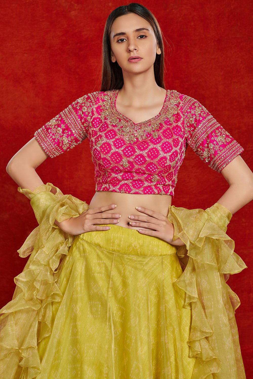 Buy beautiful pink and lime green organza lehenga set online in USA with ruffle dupatta.  Make a fashion statement on festive occasions and weddings with designer suits, Indian dresses, Anarkali suits, palazzo suits, designer gowns, sharara suits from Pure Elegance Indian fashion store in USA.-closeup