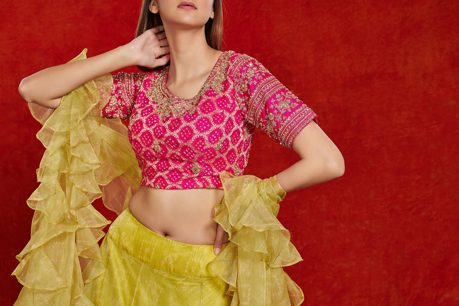 Buy beautiful pink and lime green organza lehenga set online in USA with ruffle dupatta.  Make a fashion statement on festive occasions and weddings with designer suits, Indian dresses, Anarkali suits, palazzo suits, designer gowns, sharara suits from Pure Elegance Indian fashion store in USA.-blouse