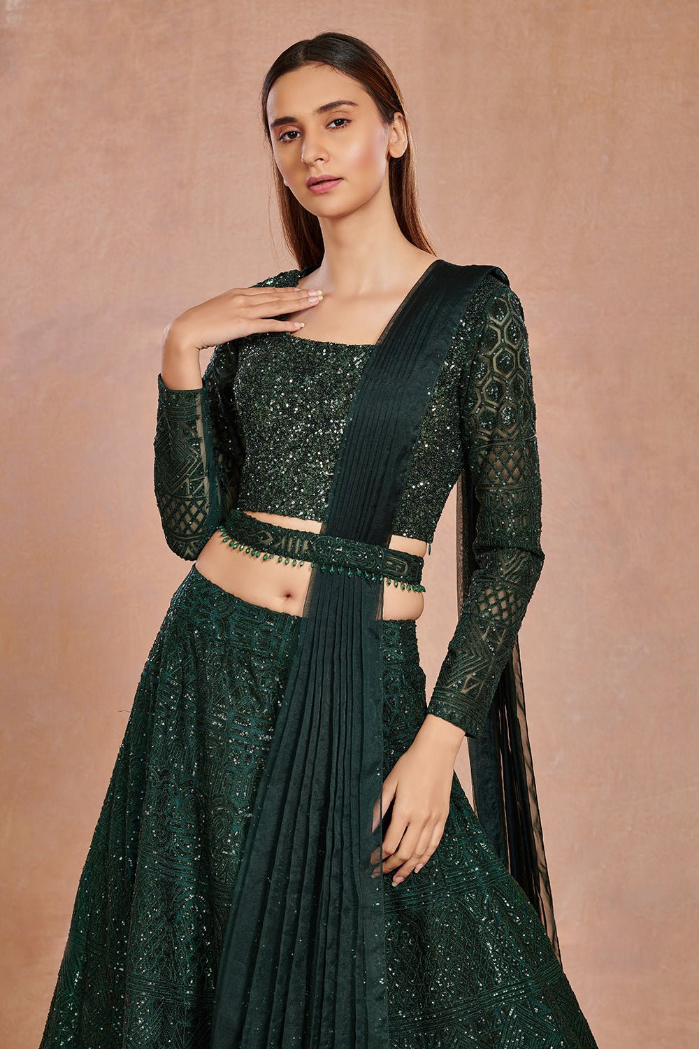 Buy beautiful bottle green shimmer and organza lehenga online in USA with belt.  Make a fashion statement on festive occasions and weddings with designer suits, Indian dresses, Anarkali suits, palazzo suits, designer gowns, sharara suits from Pure Elegance Indian fashion store in USA.-closeup