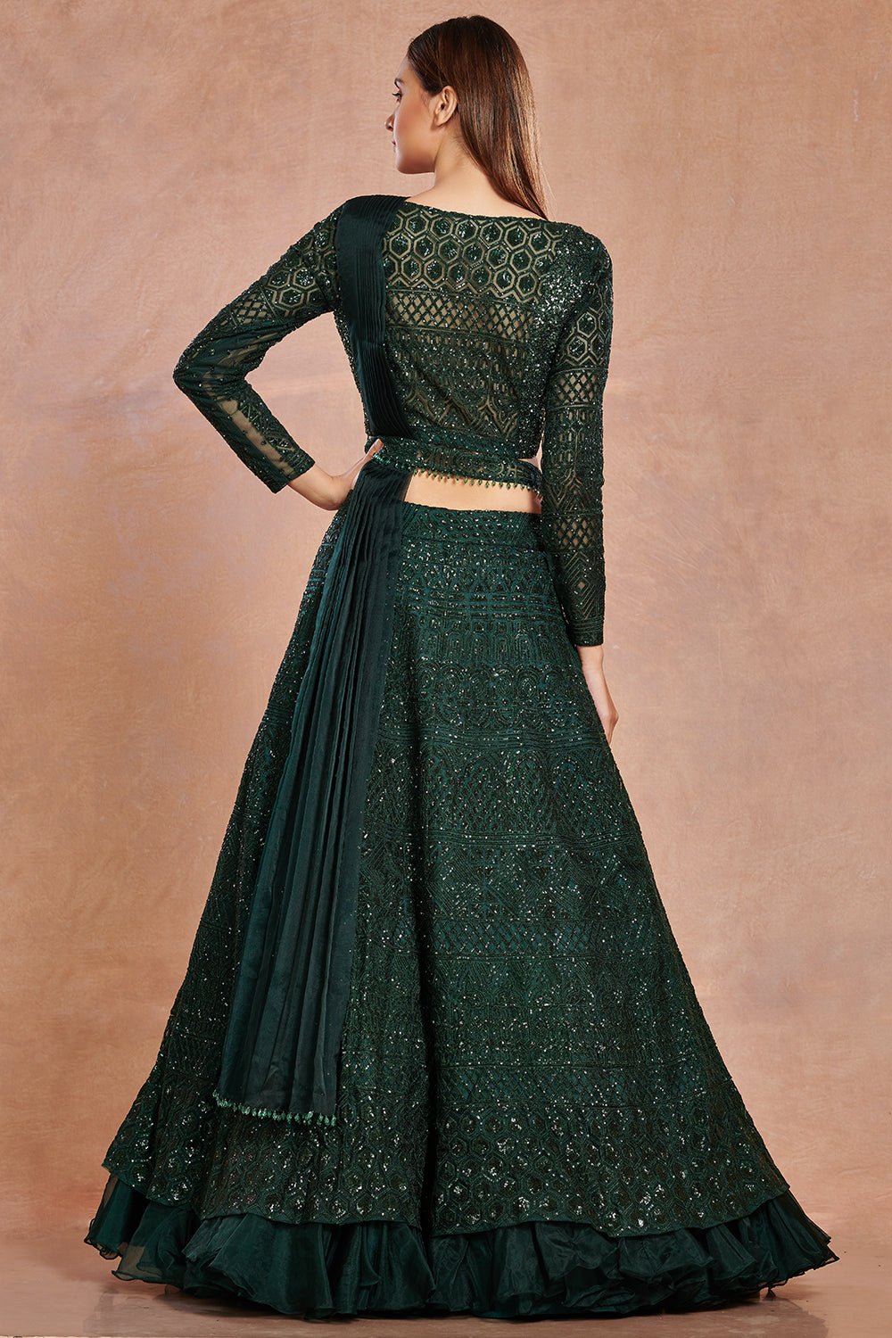 Buy beautiful bottle green shimmer and organza lehenga online in USA with belt.  Make a fashion statement on festive occasions and weddings with designer suits, Indian dresses, Anarkali suits, palazzo suits, designer gowns, sharara suits from Pure Elegance Indian fashion store in USA.-back