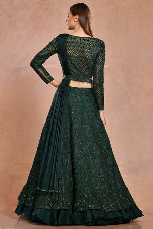 Buy beautiful bottle green shimmer and organza lehenga online in USA with belt.  Make a fashion statement on festive occasions and weddings with designer suits, Indian dresses, Anarkali suits, palazzo suits, designer gowns, sharara suits from Pure Elegance Indian fashion store in USA.-back