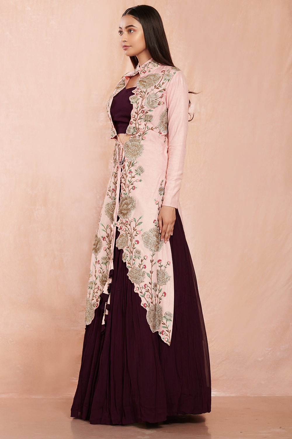 Buy beautiful wine color crop blouse and skirt online in USA with pink embroidered jacket.  Make a fashion statement on festive occasions and weddings with designer suits, Indian dresses, Anarkali suits, palazzo suits, designer gowns, sharara suits from Pure Elegance Indian fashion store in USA.-right