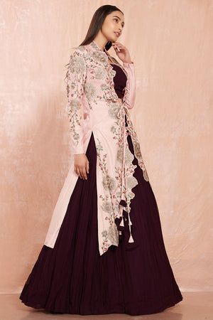 Buy beautiful wine color crop blouse and skirt online in USA with pink embroidered jacket.  Make a fashion statement on festive occasions and weddings with designer suits, Indian dresses, Anarkali suits, palazzo suits, designer gowns, sharara suits from Pure Elegance Indian fashion store in USA.-left