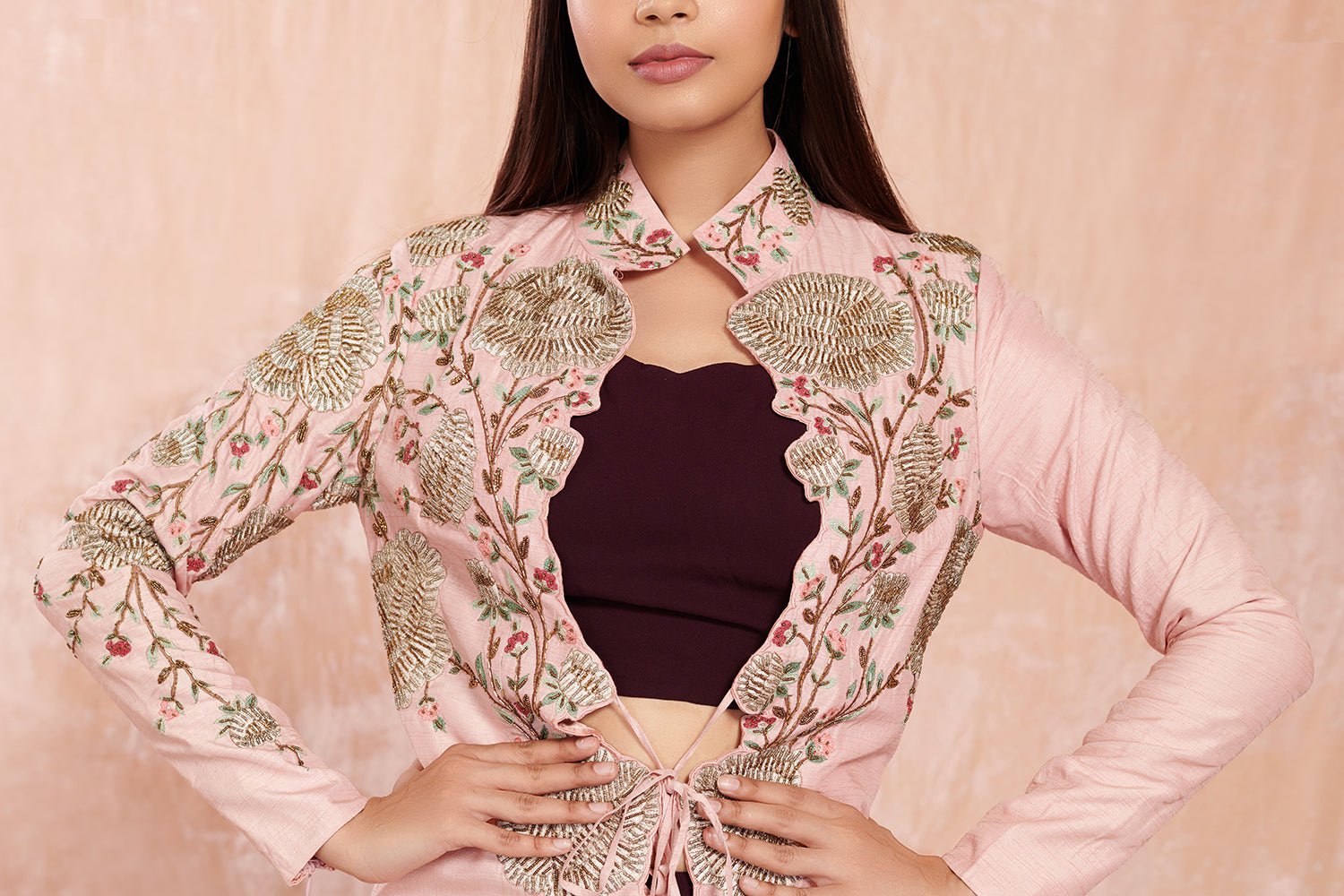 Buy beautiful wine color crop blouse and skirt online in USA with pink embroidered jacket.  Make a fashion statement on festive occasions and weddings with designer suits, Indian dresses, Anarkali suits, palazzo suits, designer gowns, sharara suits from Pure Elegance Indian fashion store in USA.-closeup