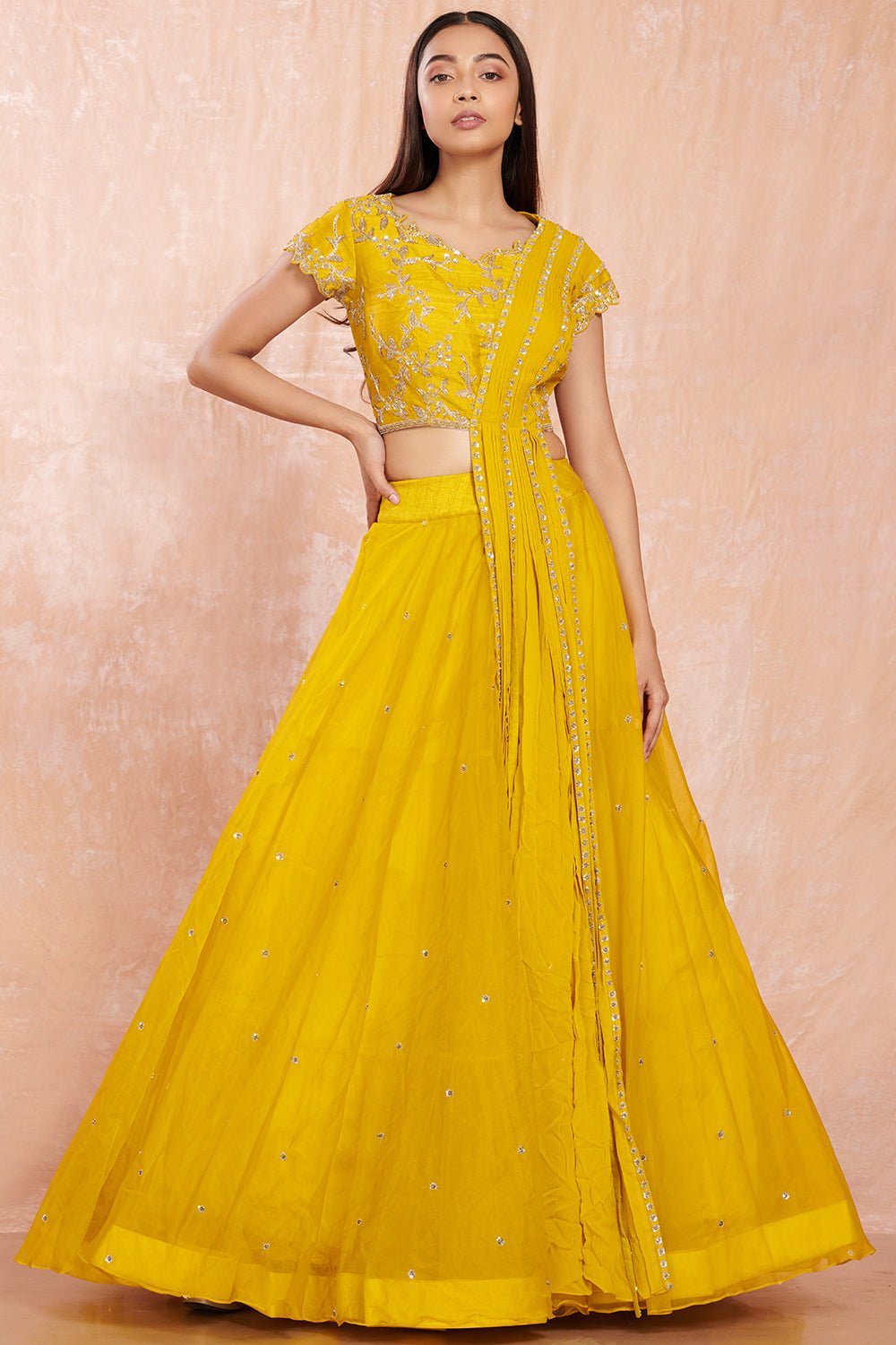 Buy stunning yellow designer net lehenga online in USA with silver floral embroidery.  Make a fashion statement on festive occasions and weddings with designer suits, Indian dresses, Anarkali suits, palazzo suits, designer gowns, sharara suits from Pure Elegance Indian fashion store in USA.-full view