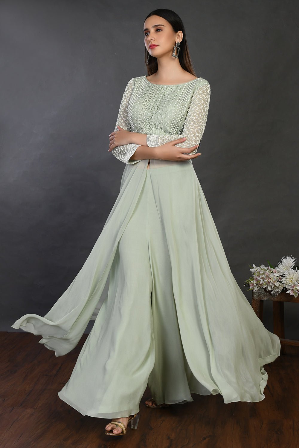 Buy gorgeous pista green embroidered front slit kurta online in USA with palazzo. Dazzle on weddings and special occasions with exquisite Indian designer dresses, sharara suits, Anarkali suits, wedding lehengas from Pure Elegance Indian fashion store in USA.-side