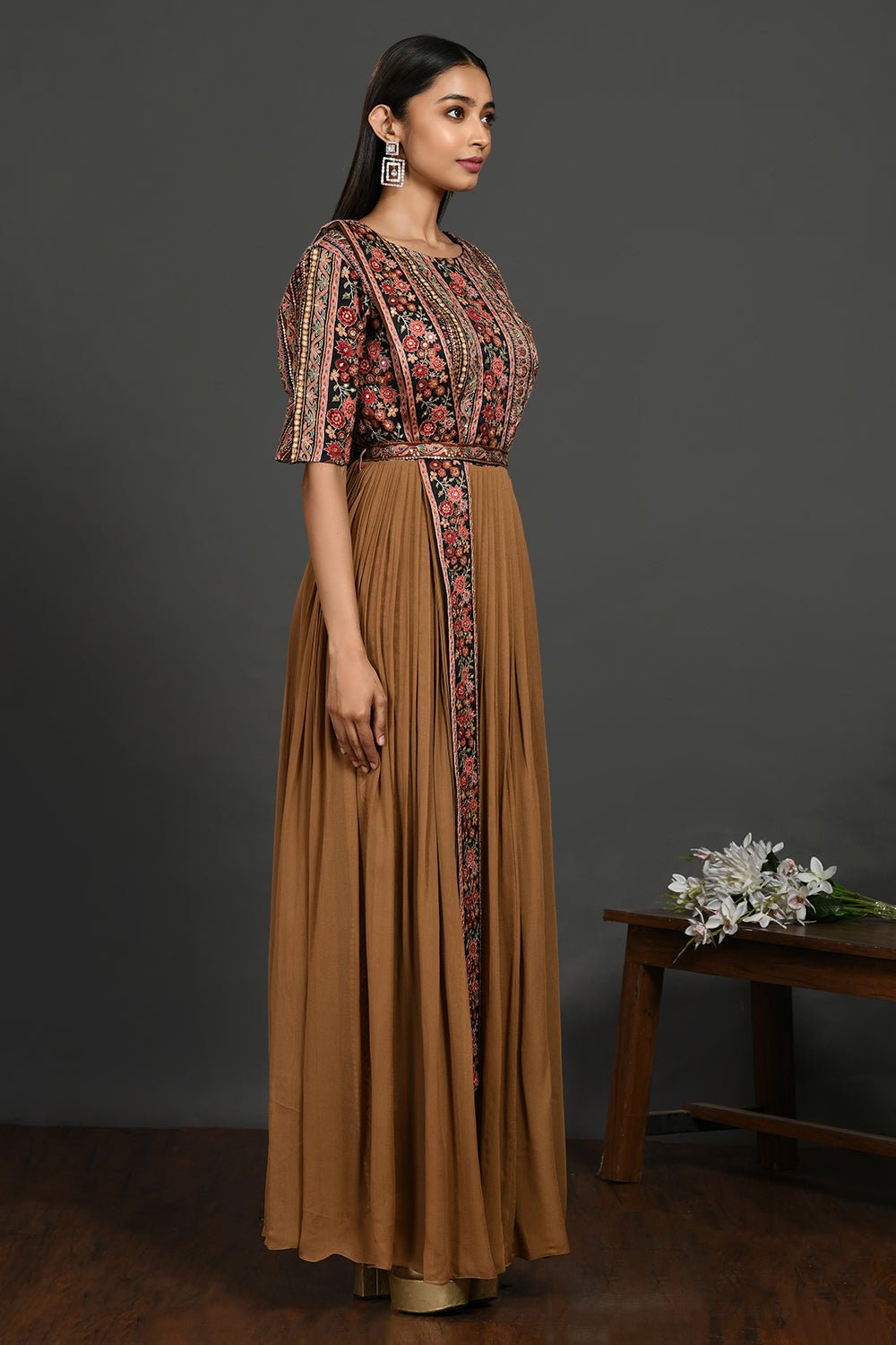 Shop stunning brown maxi dress online in USA with printed bodice. Dazzle on weddings and special occasions with exquisite Indian designer dresses, sharara suits, Anarkali suits, wedding lehengas from Pure Elegance Indian fashion store in USA.-side