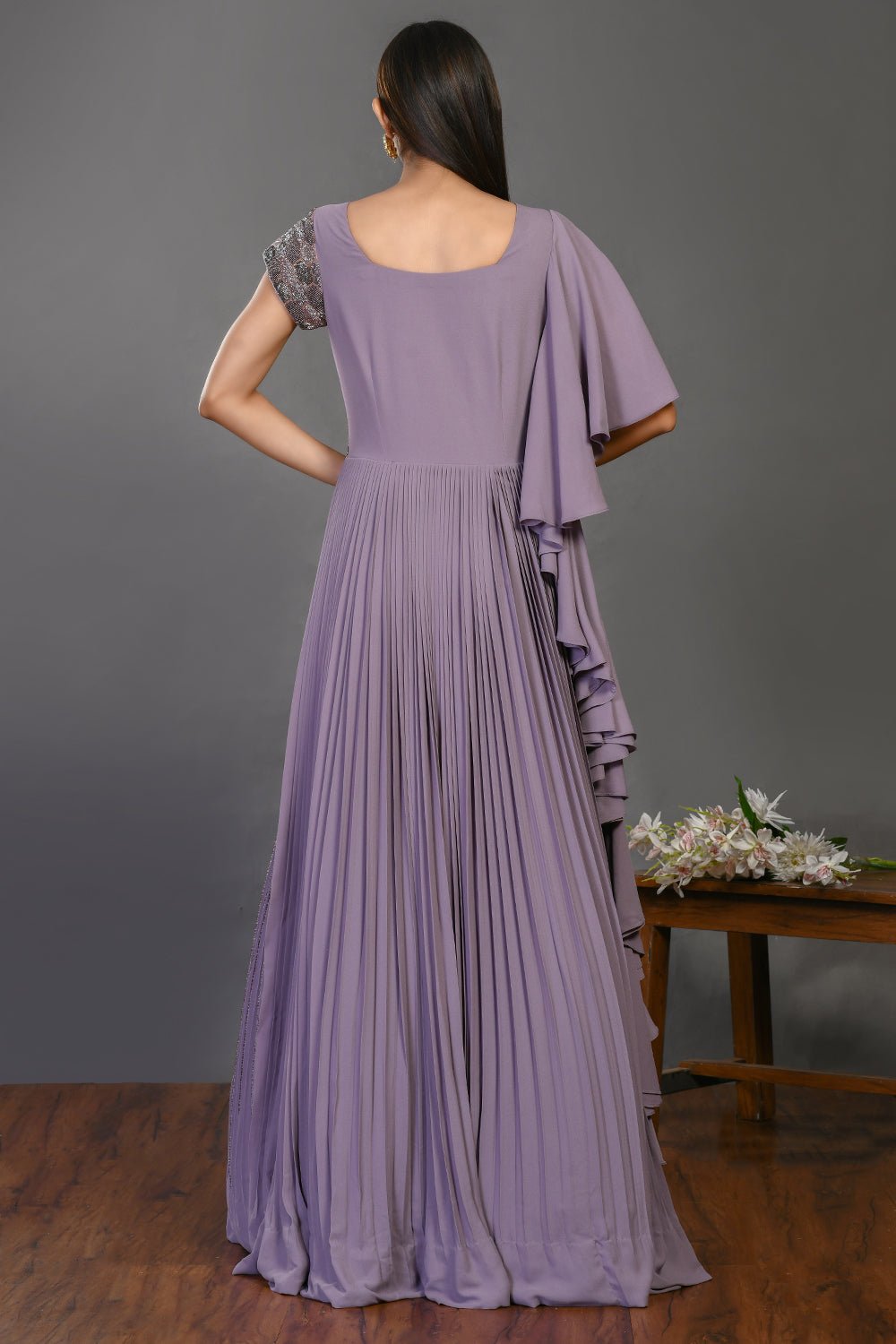 Buy stunning mauve designer gown online in USA with embroidered bodice. Dazzle on weddings and special occasions with exquisite Indian designer dresses, sharara suits, Anarkali suits, wedding lehengas from Pure Elegance Indian fashion store in USA.-back