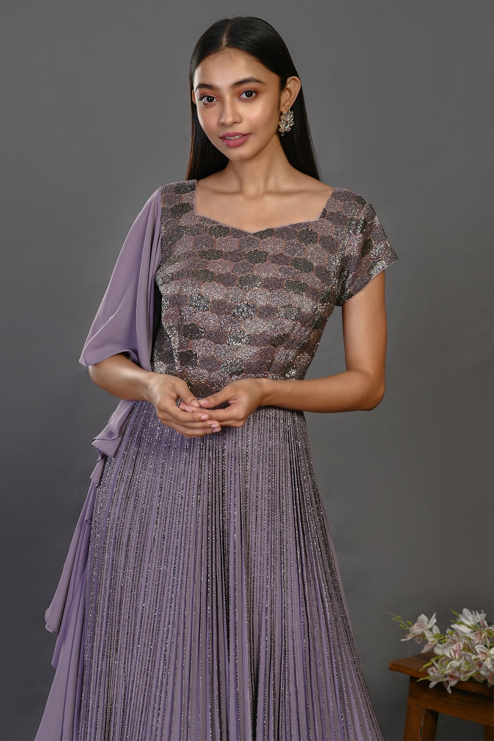 Buy stunning mauve designer gown online in USA with embroidered bodice. Dazzle on weddings and special occasions with exquisite Indian designer dresses, sharara suits, Anarkali suits, wedding lehengas from Pure Elegance Indian fashion store in USA.-closeup