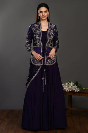 Shop gorgeous dark blue draped designer gown online in USA with jacket. Dazzle on weddings and special occasions with exquisite Indian designer dresses, sharara suits, Anarkali suits, wedding lehengas from Pure Elegance Indian fashion store in USA.-front