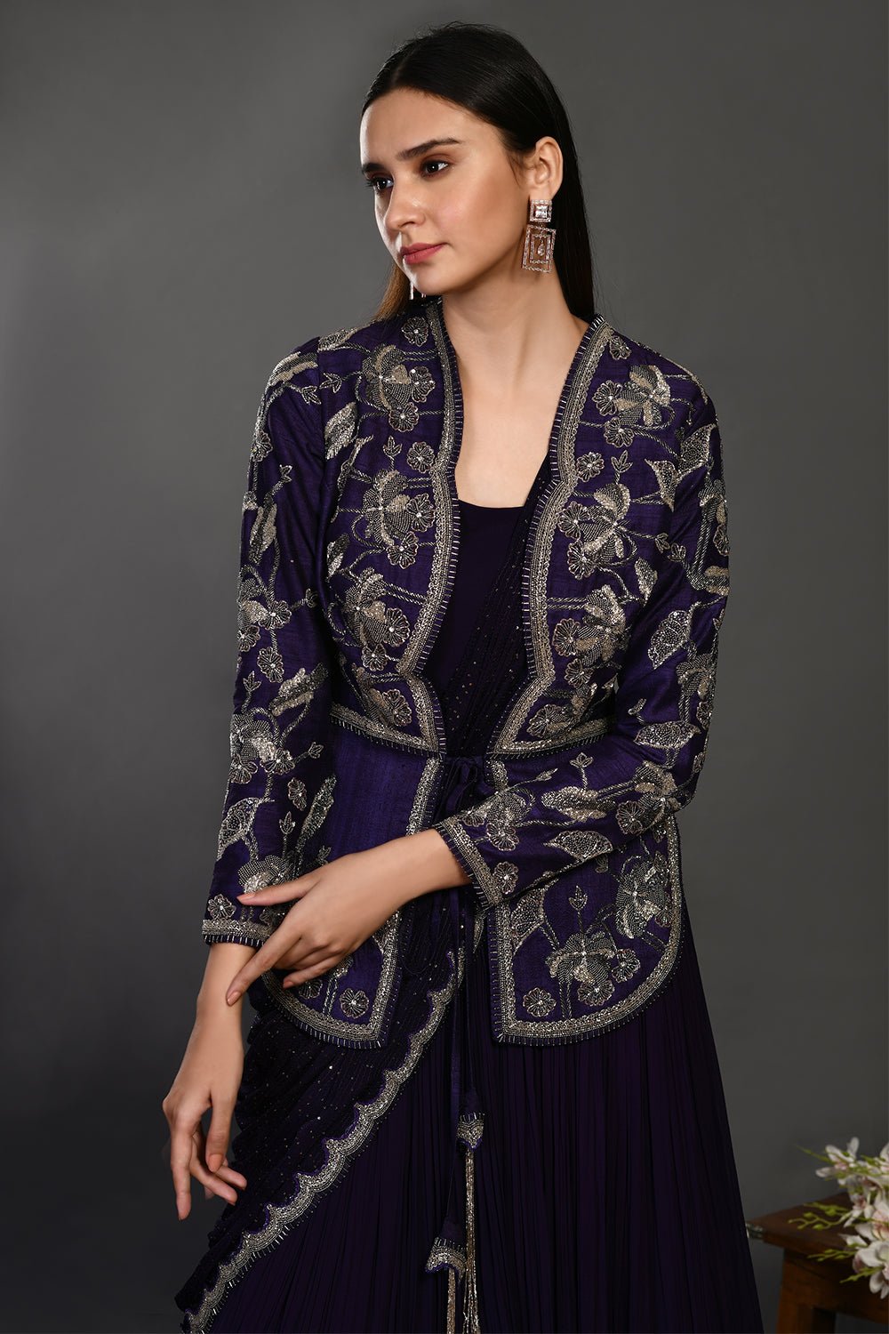 Shop gorgeous dark blue draped designer gown online in USA with jacket. Dazzle on weddings and special occasions with exquisite Indian designer dresses, sharara suits, Anarkali suits, wedding lehengas from Pure Elegance Indian fashion store in USA.-closeup