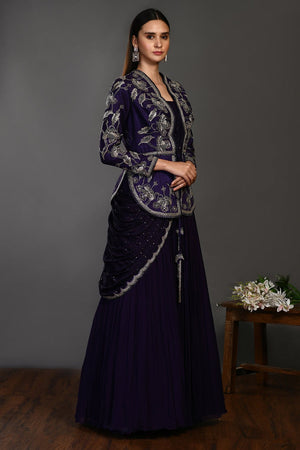 Shop gorgeous dark blue draped designer gown online in USA with jacket. Dazzle on weddings and special occasions with exquisite Indian designer dresses, sharara suits, Anarkali suits, wedding lehengas from Pure Elegance Indian fashion store in USA.-right