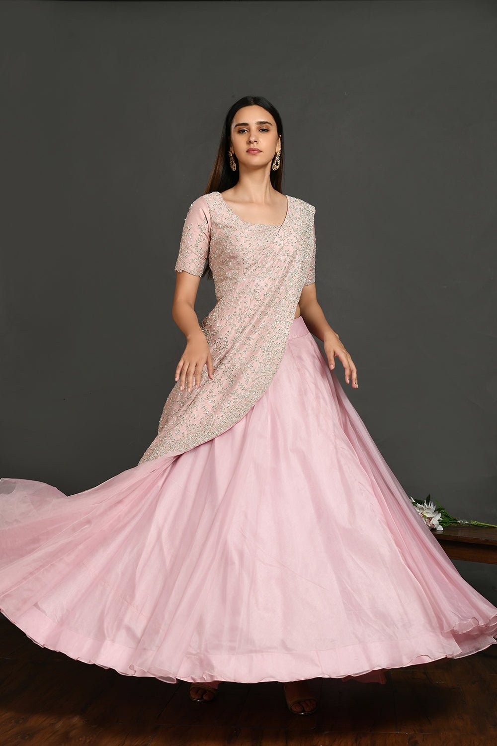 Buy beautiful pastel pink embroidered designer lehenga online in USA with dupatta. Dazzle on weddings and special occasions with exquisite Indian designer dresses, sharara suits, Anarkali suits, wedding lehengas from Pure Elegance Indian fashion store in USA.-full view