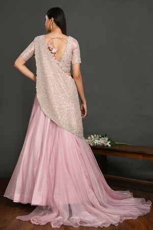 Buy beautiful pastel pink embroidered designer lehenga online in USA with dupatta. Dazzle on weddings and special occasions with exquisite Indian designer dresses, sharara suits, Anarkali suits, wedding lehengas from Pure Elegance Indian fashion store in USA.-back